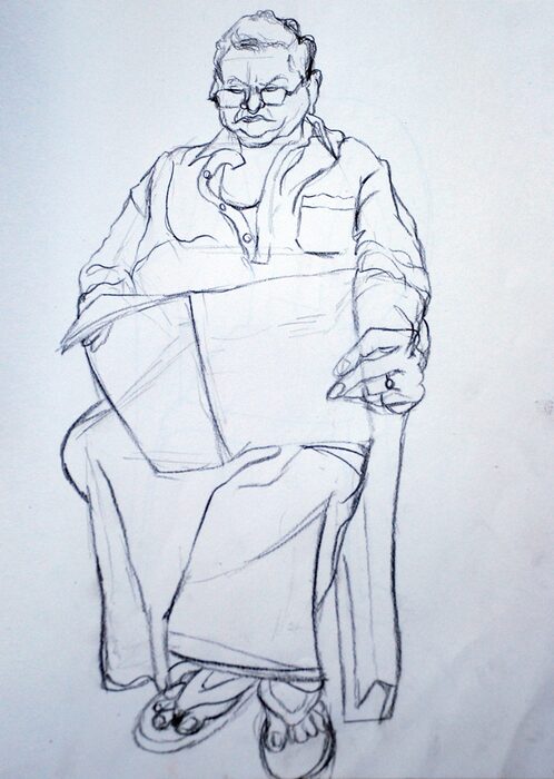 Man Reading a Newspaper